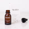 Medik8 Calmwise Serum 15ml flacone con contagocce e confezione su marmo