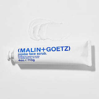 Malin+Goetz Jojoba Face Scrub tube en substantie
