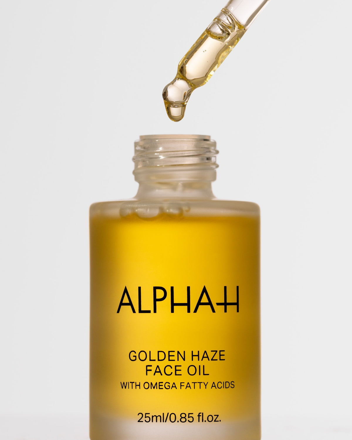 Alpha-H Golden Haze Face Oil flacone con contagocce