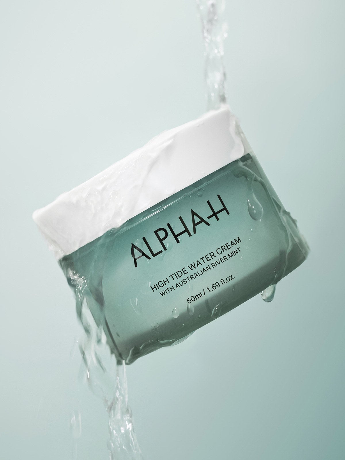 Alpha-H High Tide Water Cream vasetto sotto l'acqua corrente