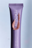 Alpha-H Peptide Lip Perfector tubo con texture