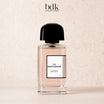 BDK Parfums 312 Saint-Honoré flacone su sfondo di pietra chiara