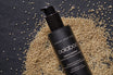 Oolaboo Bouncy Bamboo Repair Shampoo su un letto di semi