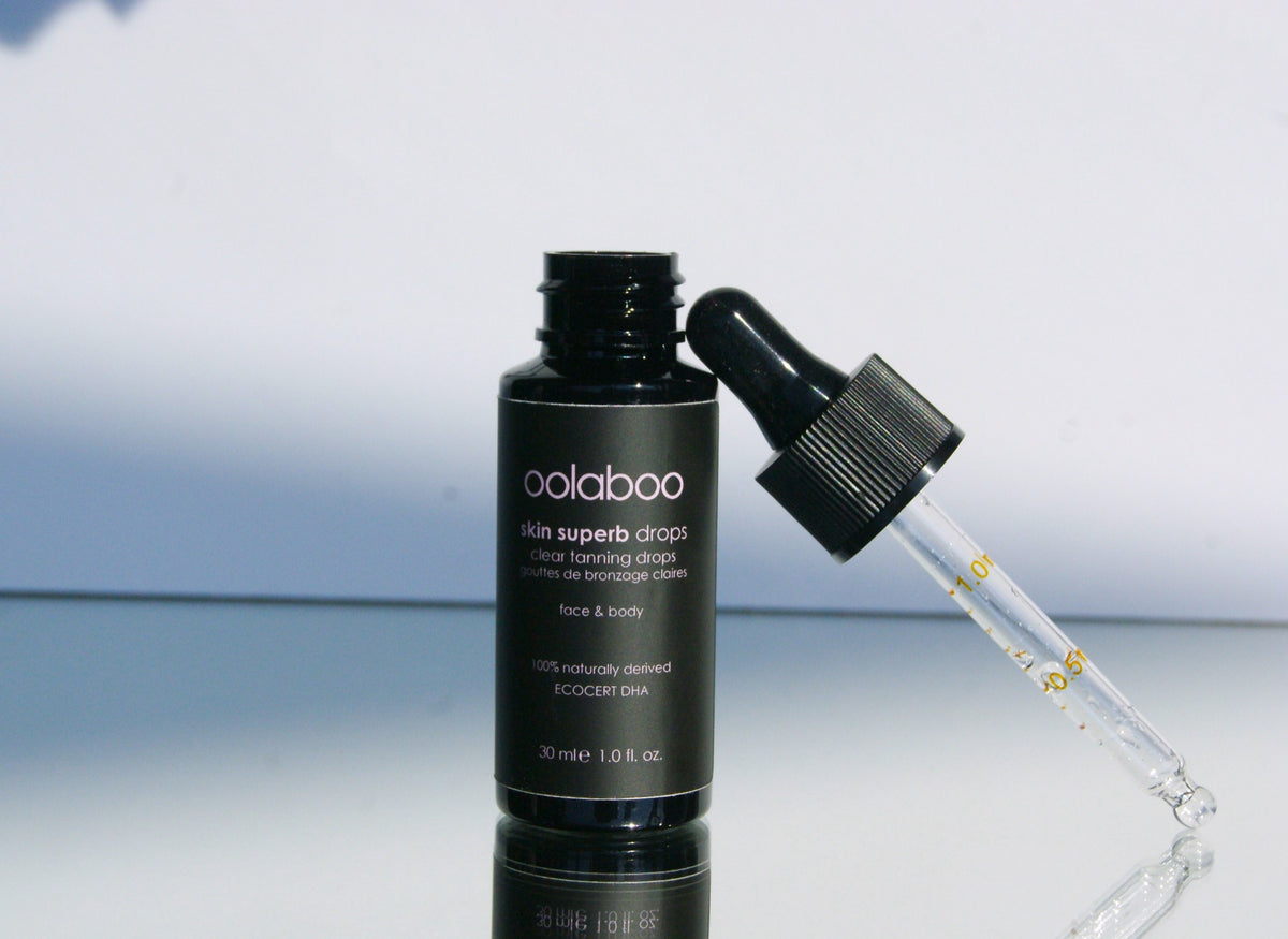 Oolaboo Skin Superb Clear Tanning Drops 30 ml con pipetta aperta