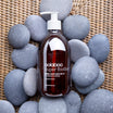 Oolaboo Super Foodies Happy Hand Soap su ciottoli grigi